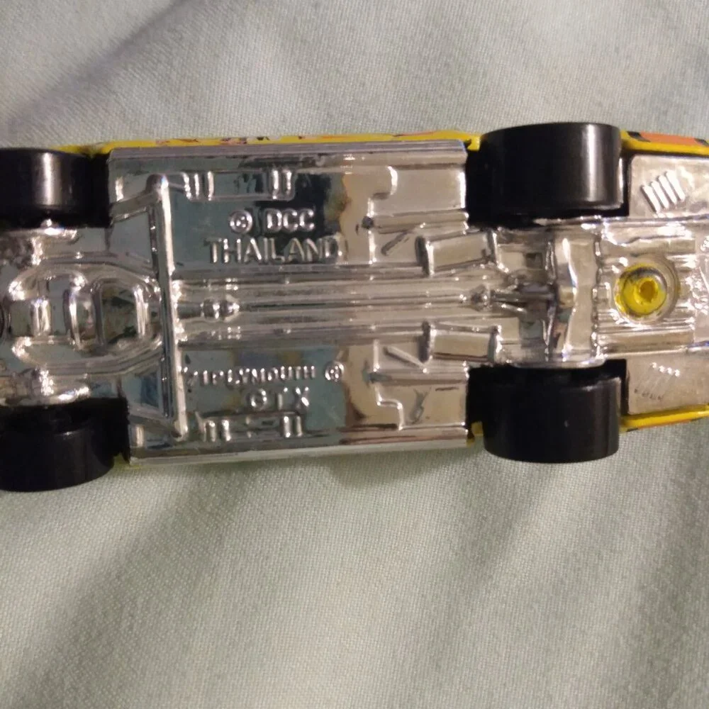 2002 Golden Wheel and 2004 Hot Wheels car